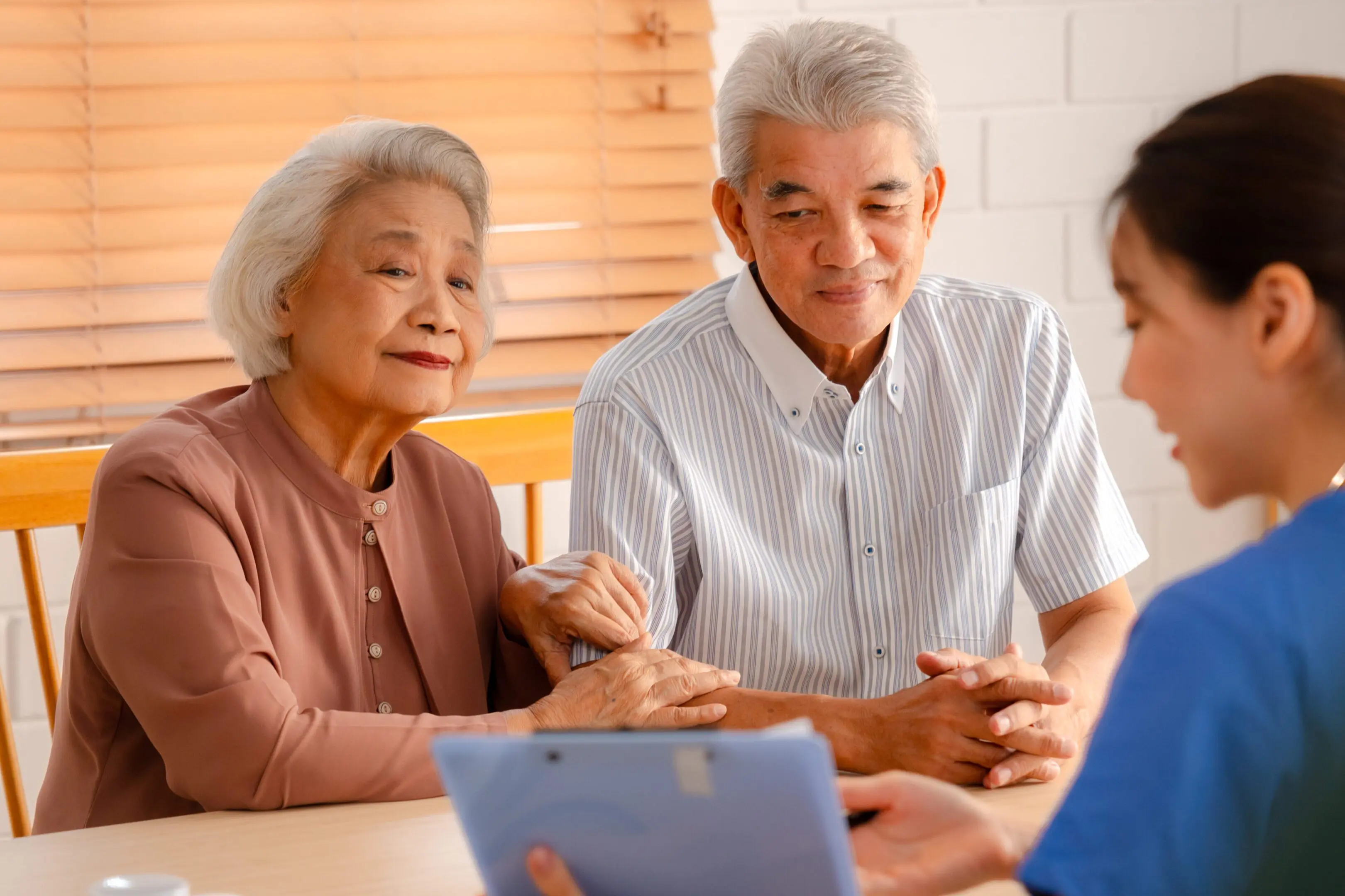Senior Man Receives Medical Check-Up Therapy from Doctor in Hospital Clinic: Professional Health Care Service for Elderly Patients Facing Health Problems, with Comprehensive Exams and Consultations
