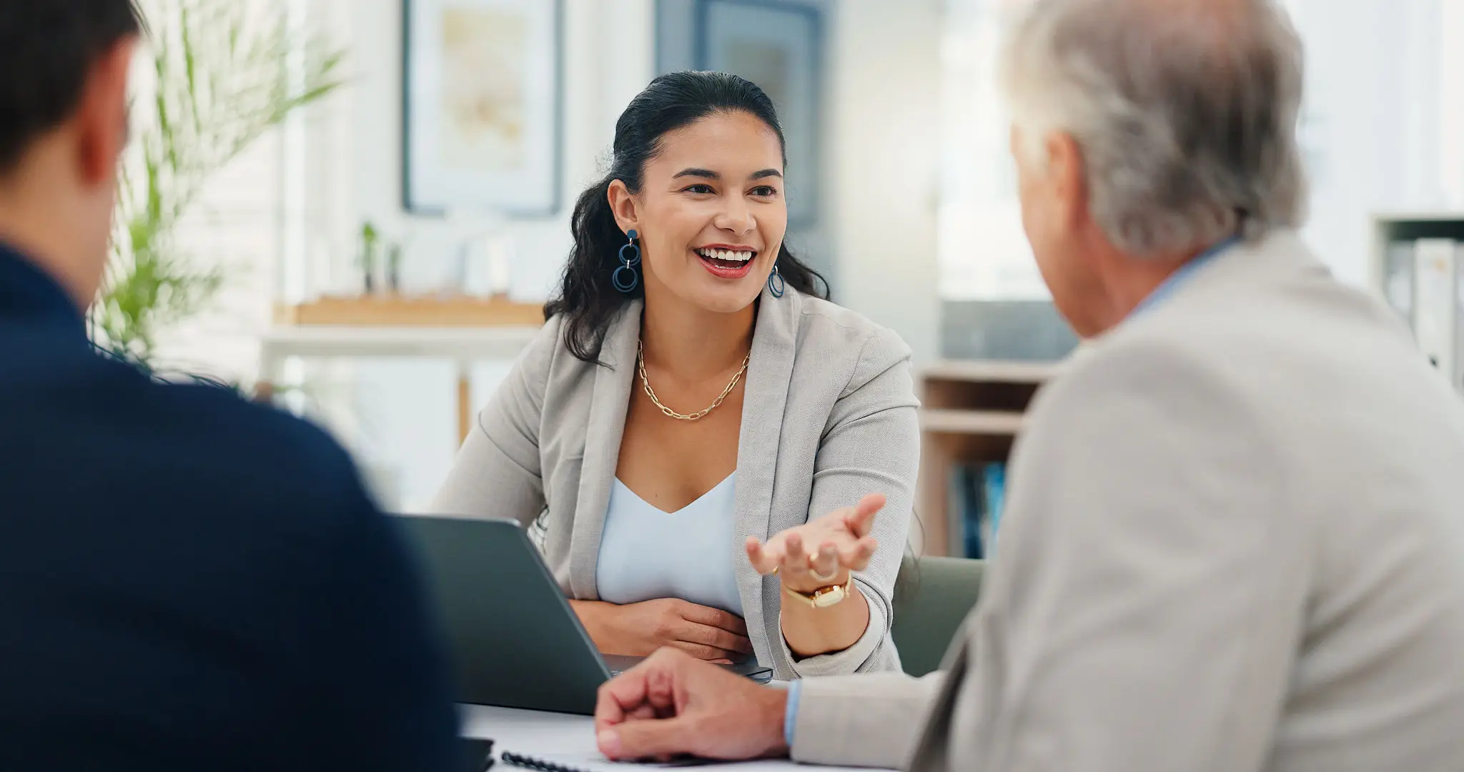 Two professionals engaging in a friendly business discussion.
