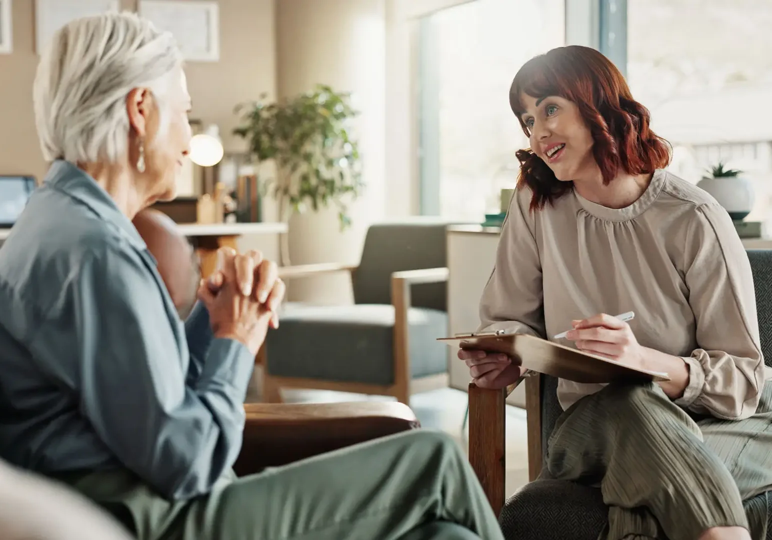 Therapist and patient engaged in a counseling session.